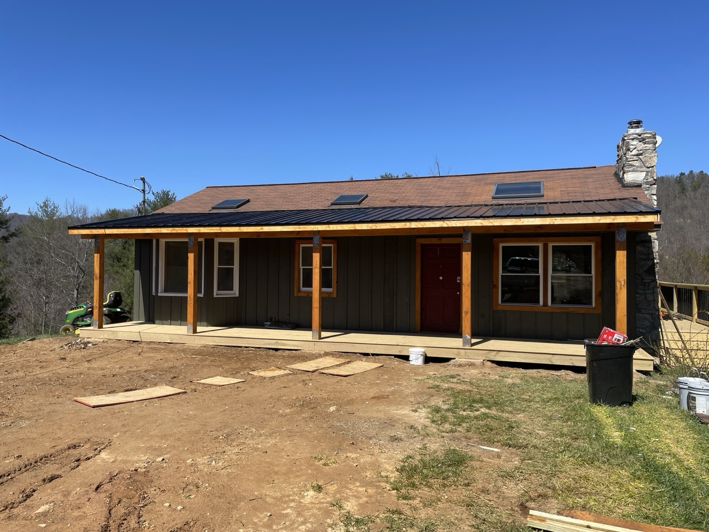 Single-story home with a new timber-post front porch